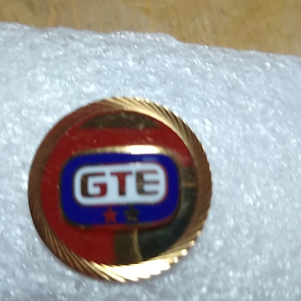 Vintage emblem pin.